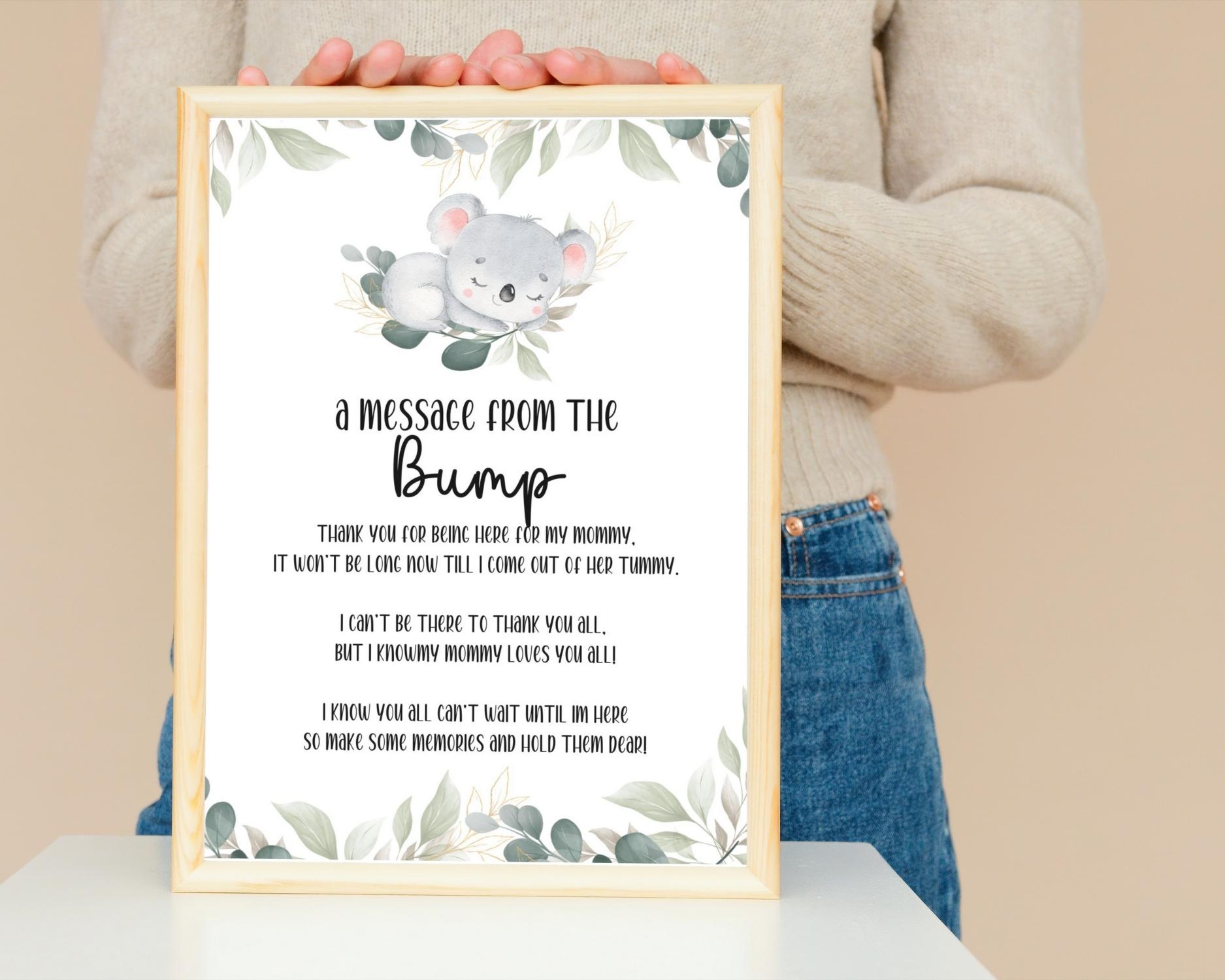 A message from the bump table sign for koala themed baby shower party